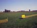 Field shot with sign